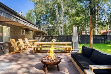 This five bedroom West Aspen retreat blends the warmth of a - photo 22