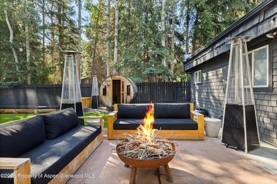 This five bedroom West Aspen retreat blends the warmth of a - photo 23