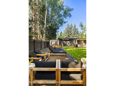 This five bedroom West Aspen retreat blends the warmth of a - photo 26
