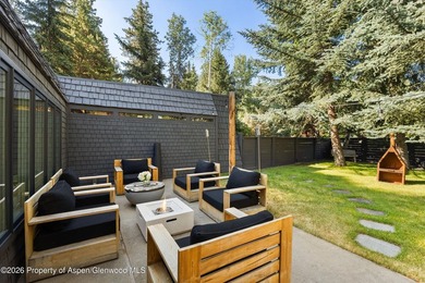 This five bedroom West Aspen retreat blends the warmth of a - photo 30