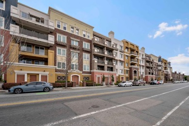 Stunning third-floor condo with serene hill views, flooding the