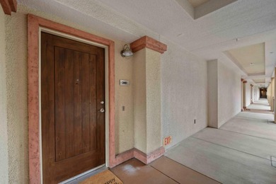 Stunning third-floor condo with serene hill views, flooding the