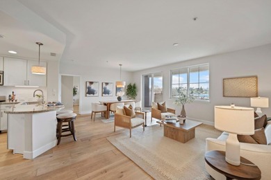 Stunning third-floor condo with serene hill views, flooding the