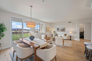 Stunning third-floor condo with serene hill views, flooding the