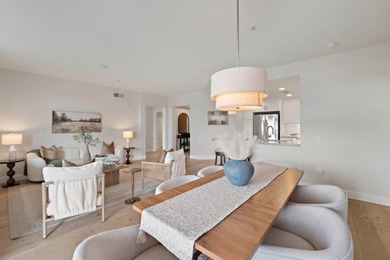 Stunning third-floor condo with serene hill views, flooding the