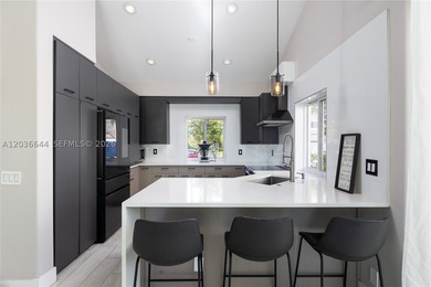 Lakefront living doesn't get more complete than this. Fully - photo 9
