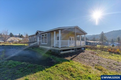 Brand-new and never lived in, offering sweeping views and a