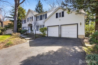 Custom built 5-bedroom Center Hall Colonial in one of East - photo 1