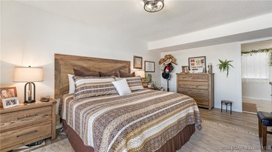 Beautifully updated waterfront condominium with stunning lake