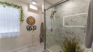 Beautifully updated waterfront condominium with stunning lake