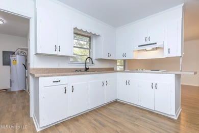 Enjoy waterfront living on the bayou in Gautier, conveniently - photo 20
