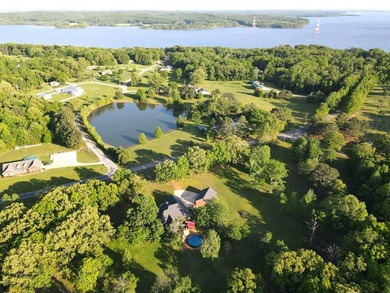 Custom-built brick home situated on 9.7 acres, located less than - photo 2
