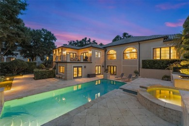 Nestled within the gates of the renowned Isleworth Golf & - photo 3