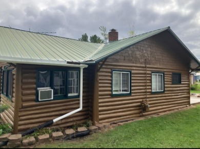 Lake Home ActiveUnderContr in Houghton Lake, Michigan