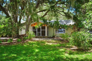 Welcome to Old Florida! Stepping onto the screened porch is like - photo 1