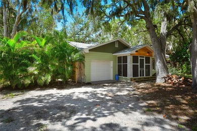 Welcome to Old Florida! Stepping onto the screened porch is like - photo 5