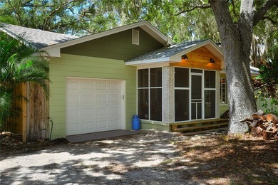 Welcome to Old Florida! Stepping onto the screened porch is like - photo 6