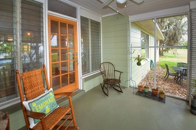 Welcome to Old Florida! Stepping onto the screened porch is like - photo 9