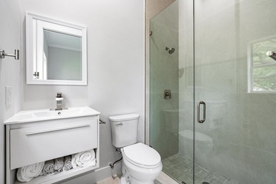 This stunning, renovated estate home is ideally situated within - photo 32