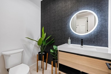This stunning, renovated estate home is ideally situated within - photo 33