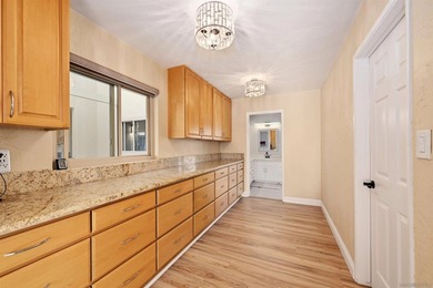 Perched on the Bay Park hillside, this 4,212 sq ft residence - photo 14