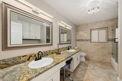 Perched on the Bay Park hillside, this 4,212 sq ft residence - photo 20