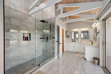 Perched on the Bay Park hillside, this 4,212 sq ft residence - photo 22