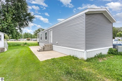 (private lake, pond, creek) Home For Sale in Beaverton Michigan