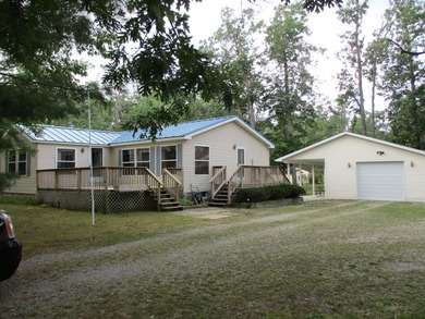 West Twin Lake Home For Sale in Lewiston Michigan