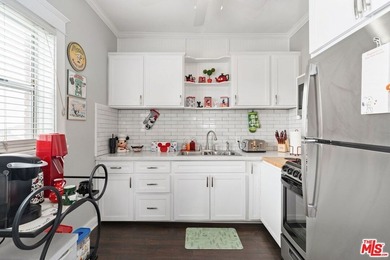 Charming, top-floor corner penthouse in the iconic Californian - photo 15