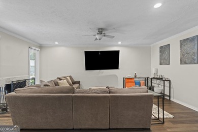 Welcome to this inviting end-unit townhome nestled in the highly - photo 13
