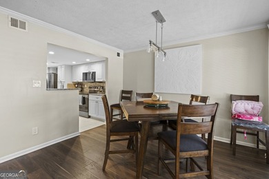Welcome to this inviting end-unit townhome nestled in the highly - photo 15