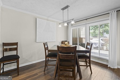 Welcome to this inviting end-unit townhome nestled in the highly - photo 16