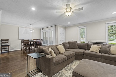 Welcome to this inviting end-unit townhome nestled in the highly - photo 17