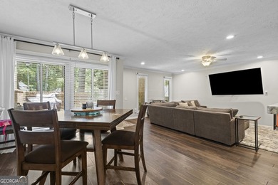 Welcome to this inviting end-unit townhome nestled in the highly - photo 19