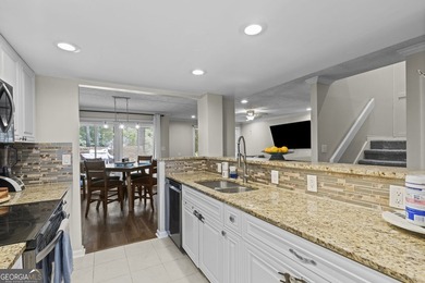Welcome to this inviting end-unit townhome nestled in the highly - photo 24