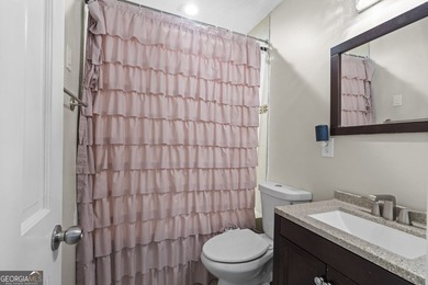 Welcome to this inviting end-unit townhome nestled in the highly - photo 25