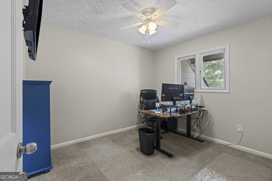 Welcome to this inviting end-unit townhome nestled in the highly - photo 26