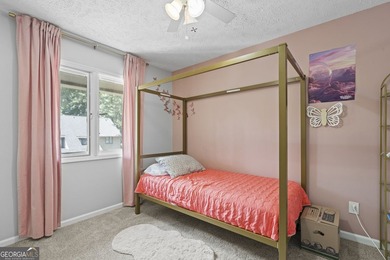 Welcome to this inviting end-unit townhome nestled in the highly - photo 29
