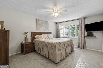 Welcome to this inviting end-unit townhome nestled in the highly - photo 30