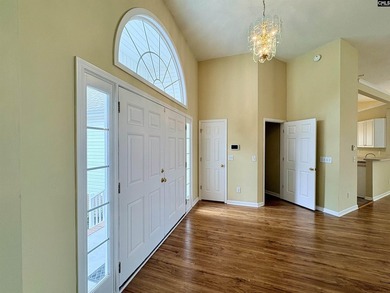 Welcome to The Summit. Step inside the foyer and into the living - photo 4