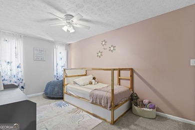 Welcome to this inviting end-unit townhome nestled in the highly - photo 34
