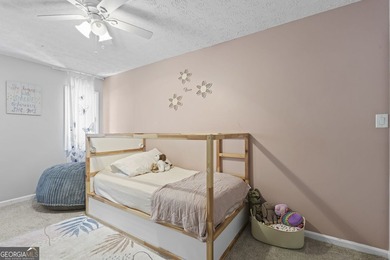 Welcome to this inviting end-unit townhome nestled in the highly - photo 35