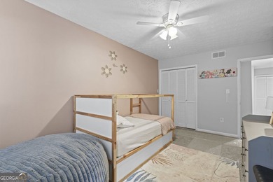 Welcome to this inviting end-unit townhome nestled in the highly - photo 36