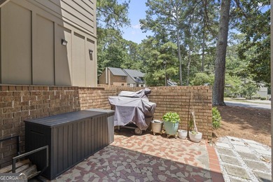 Welcome to this inviting end-unit townhome nestled in the highly - photo 37