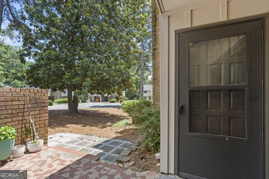 Welcome to this inviting end-unit townhome nestled in the highly - photo 38