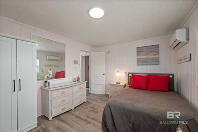 Perched high on one of Gulf Shores' most elevated points, this - photo 21
