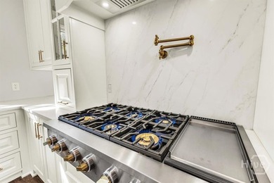 Experience luxury living in this fully renovated Savannah - photo 32