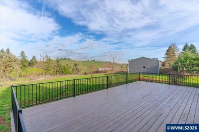 Enjoy open views of rolling hills from the 30 x 15 deck. This