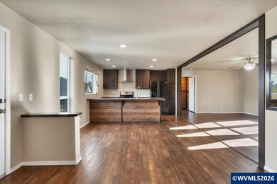 Enjoy open views of rolling hills from the 30 x 15 deck. This